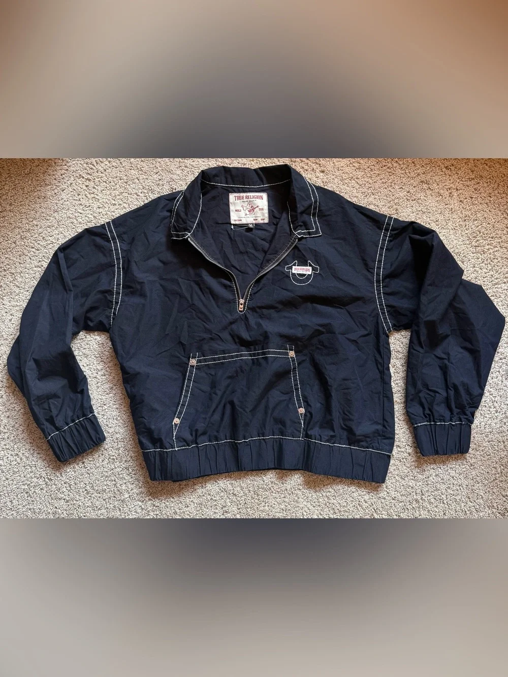 NWOT TR Black Pullover with Contrast Stitching. Half zip & kangaroo front pocket